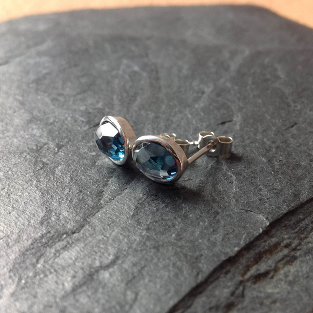 Rose cut gemstone stud earrings in silver with london blue topaz